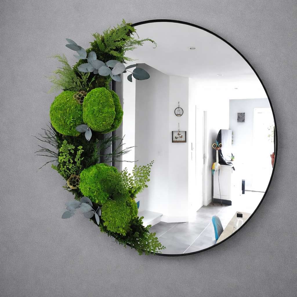 Miroir rond 50 cm bordure métal noir, végétaux stabilisés sur un côté, pièce unique artisanale murale